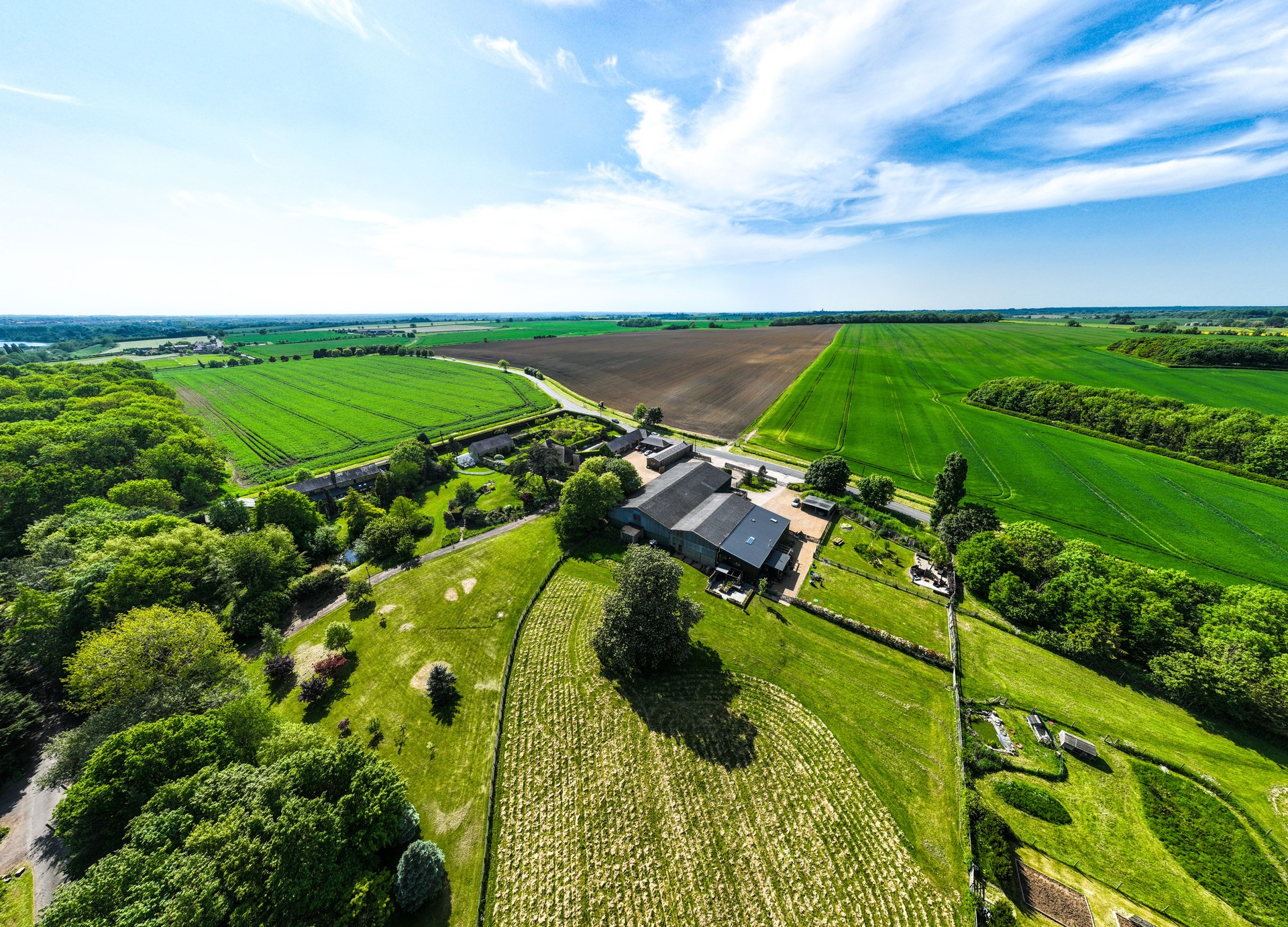 Aerial view of a beautiful agricultural fields in England